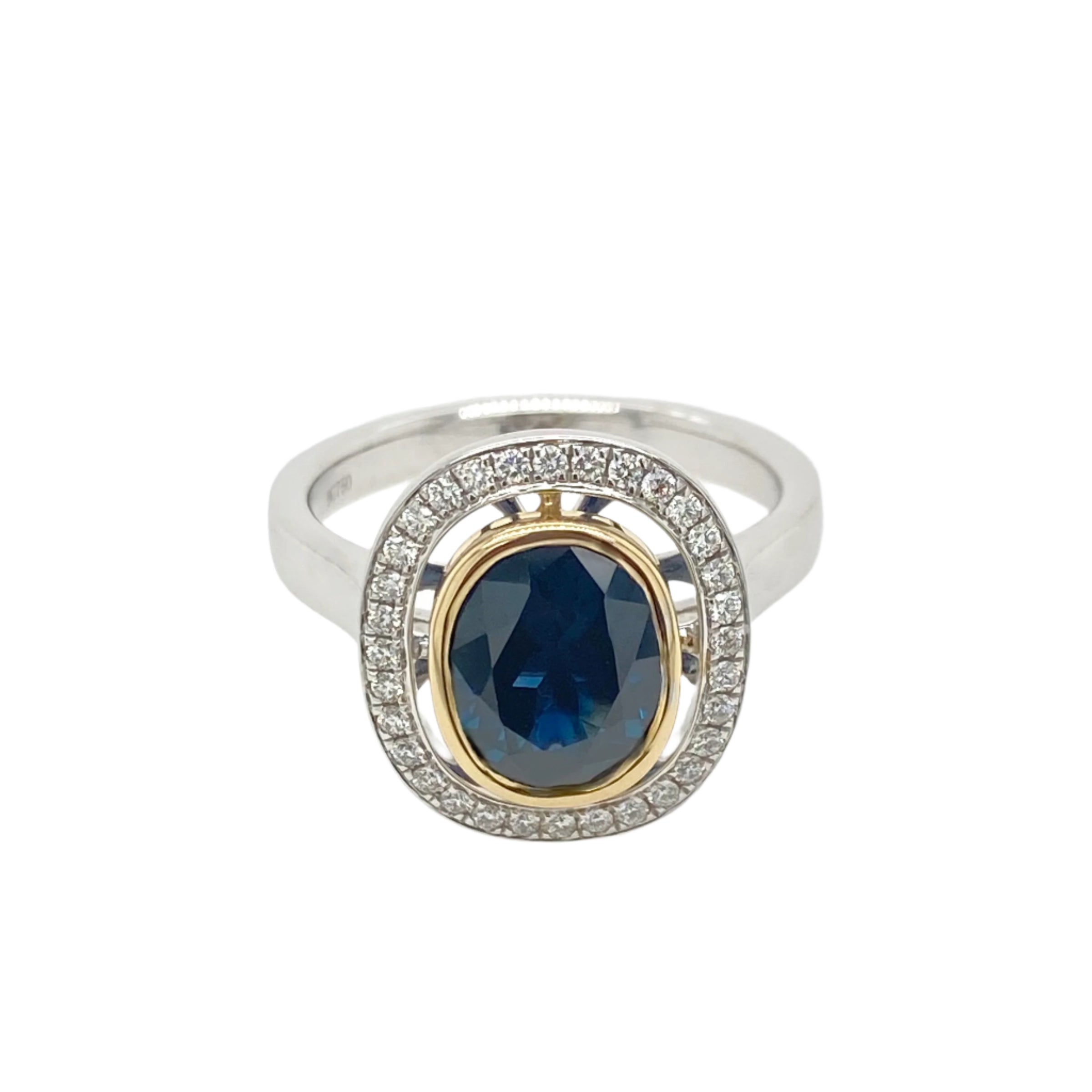 Dark Blue Inverell Sapphire and Diamond Halo Cluster Ring in 18K White Gold